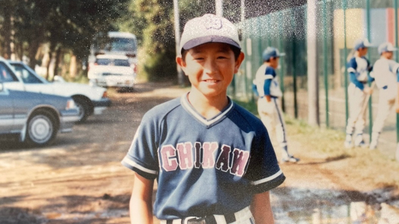 少年時代、ユニフォーム姿のGG佐藤さんの写真
